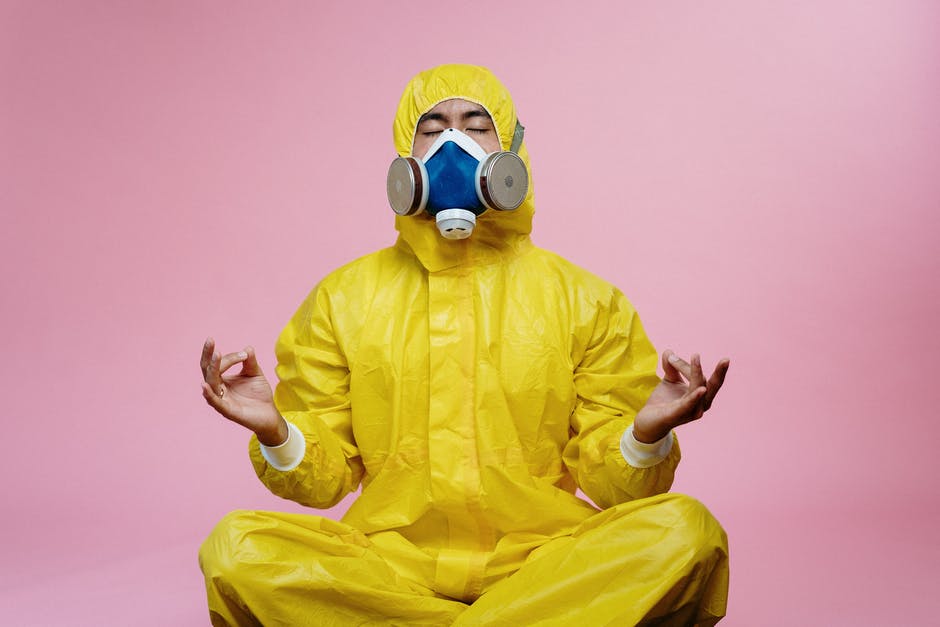 Man in a yellow protective suit