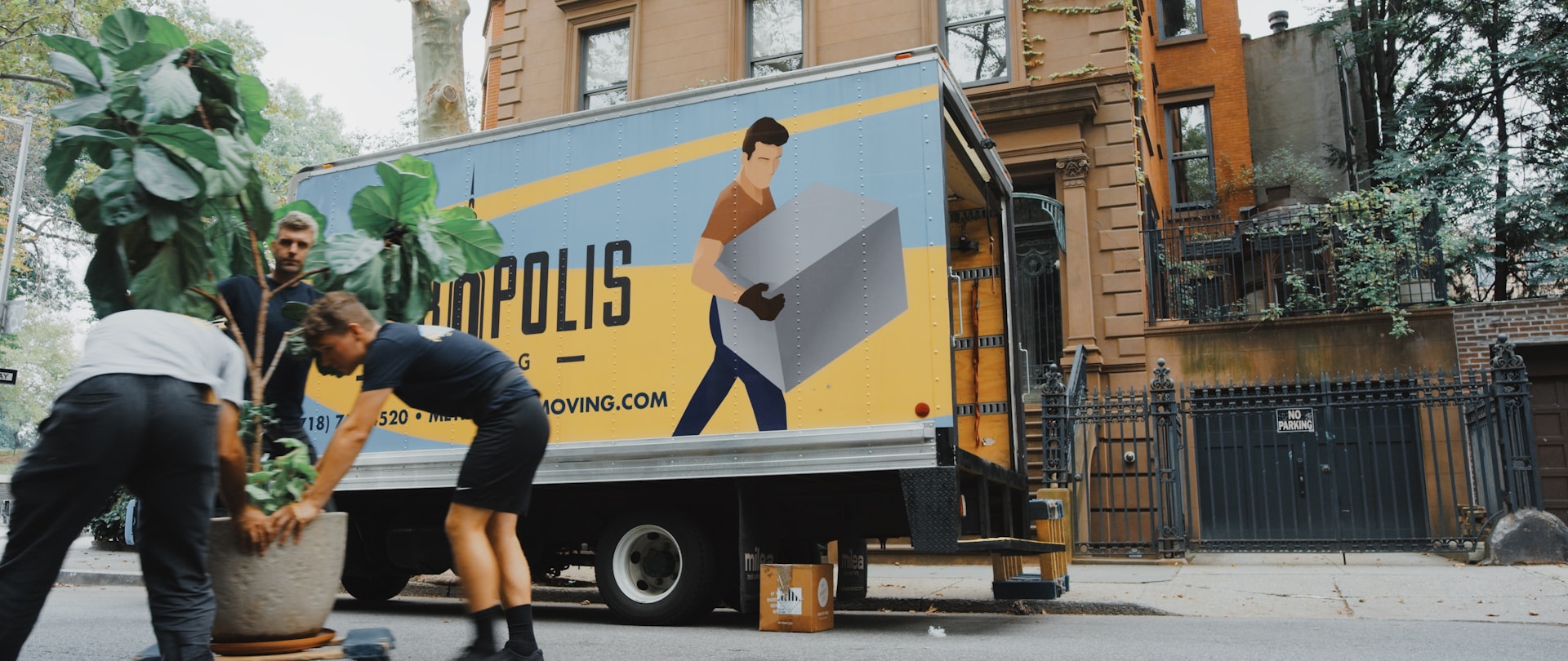 Moving truck and movers. Image by Unsplash