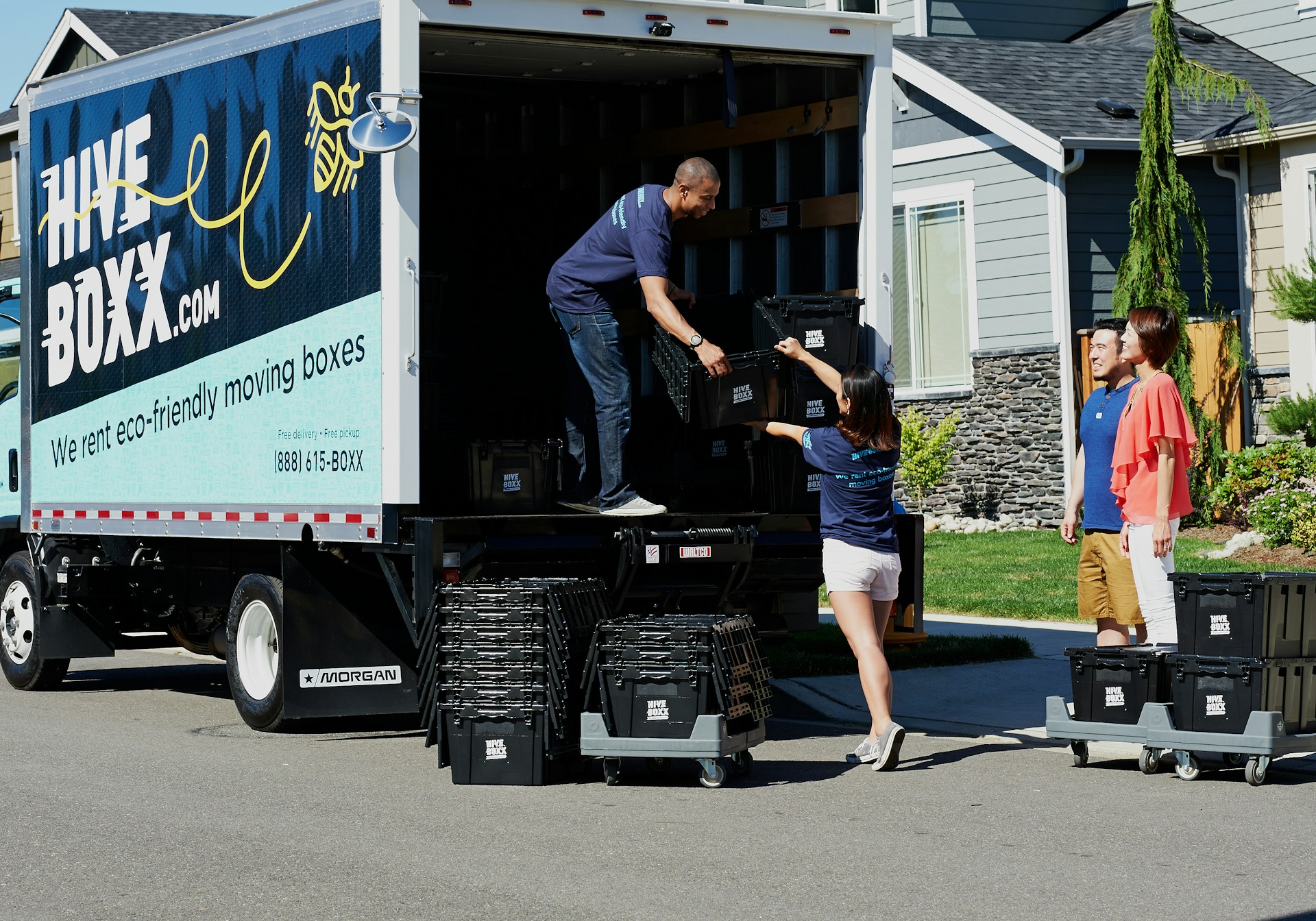 Moving truck and movers. Image by Unsplash.