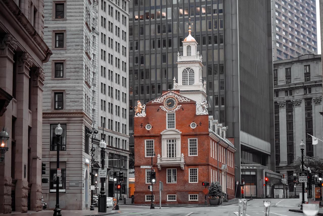 Boston Old State House in front of modern downtown office towers. Image via Pixabay