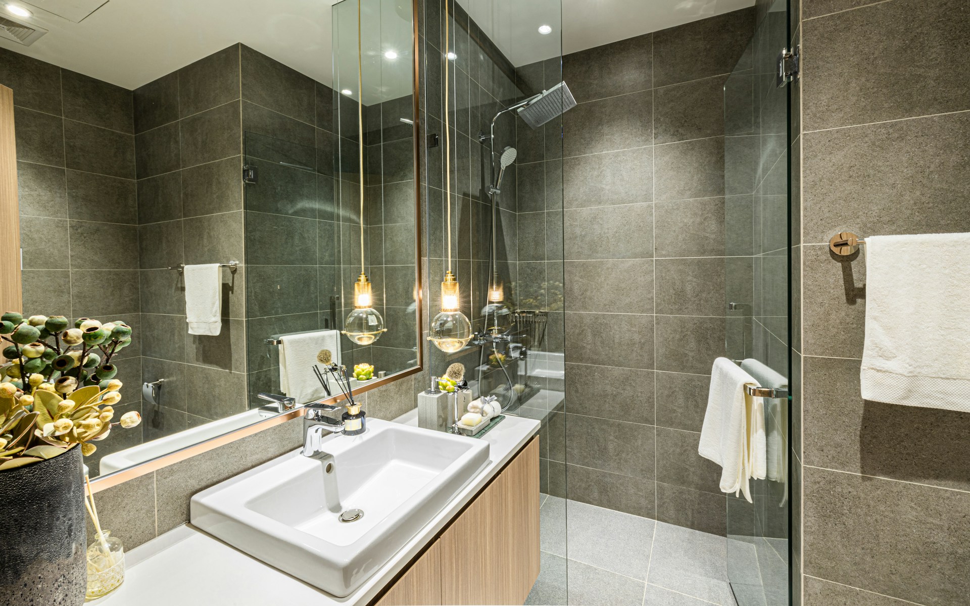 Bathroom, shower, dark tile. Image by Unsplash
