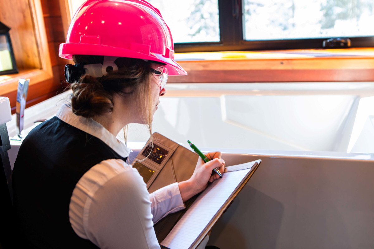 Person with a red hard hat