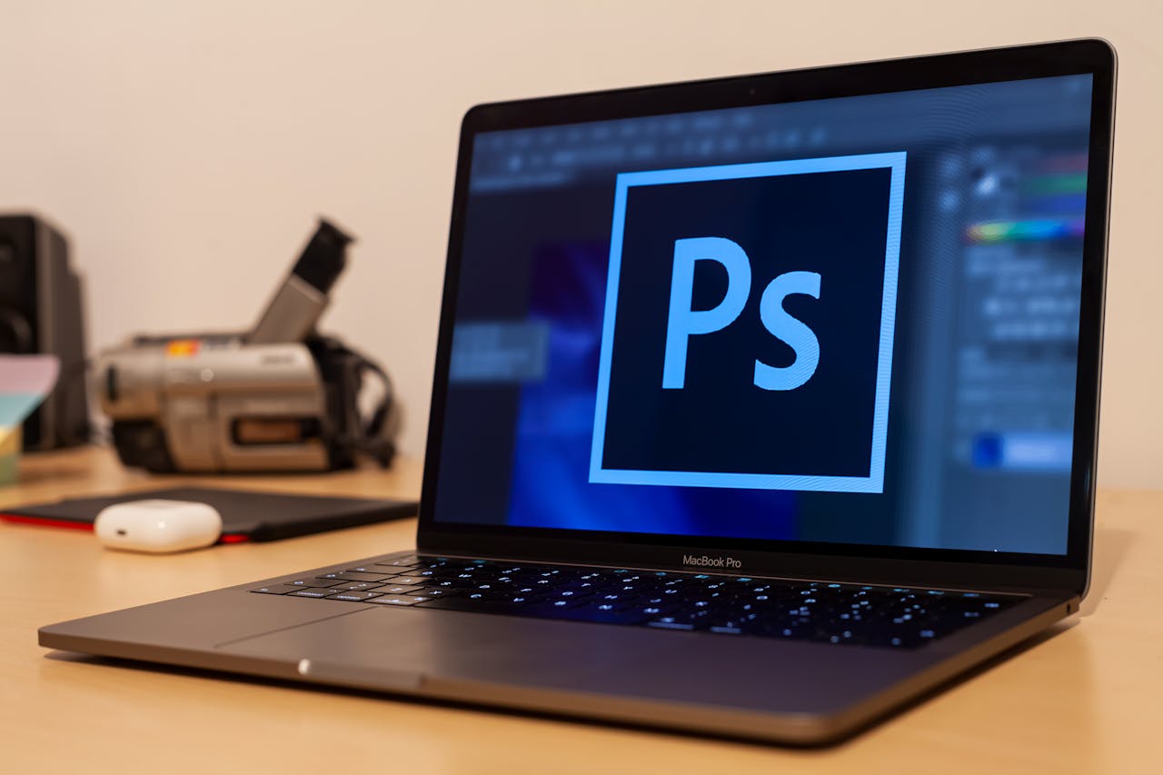 A laptop with the letters Ps on the screen. Image by Pexels