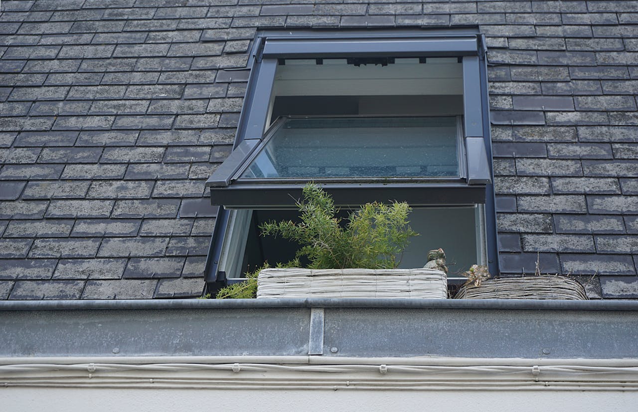 Open window on a roof. Image by Pexels