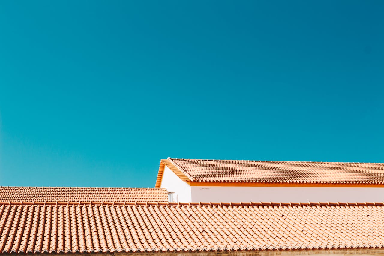 Red brick roof top. Image by Pexels