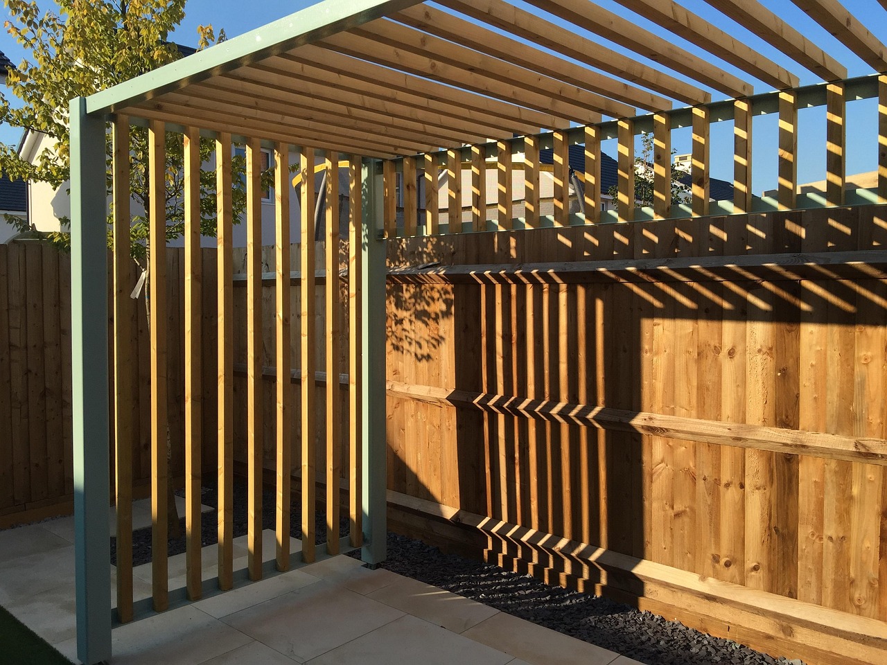 A wooden pergola. Image by Pixabay