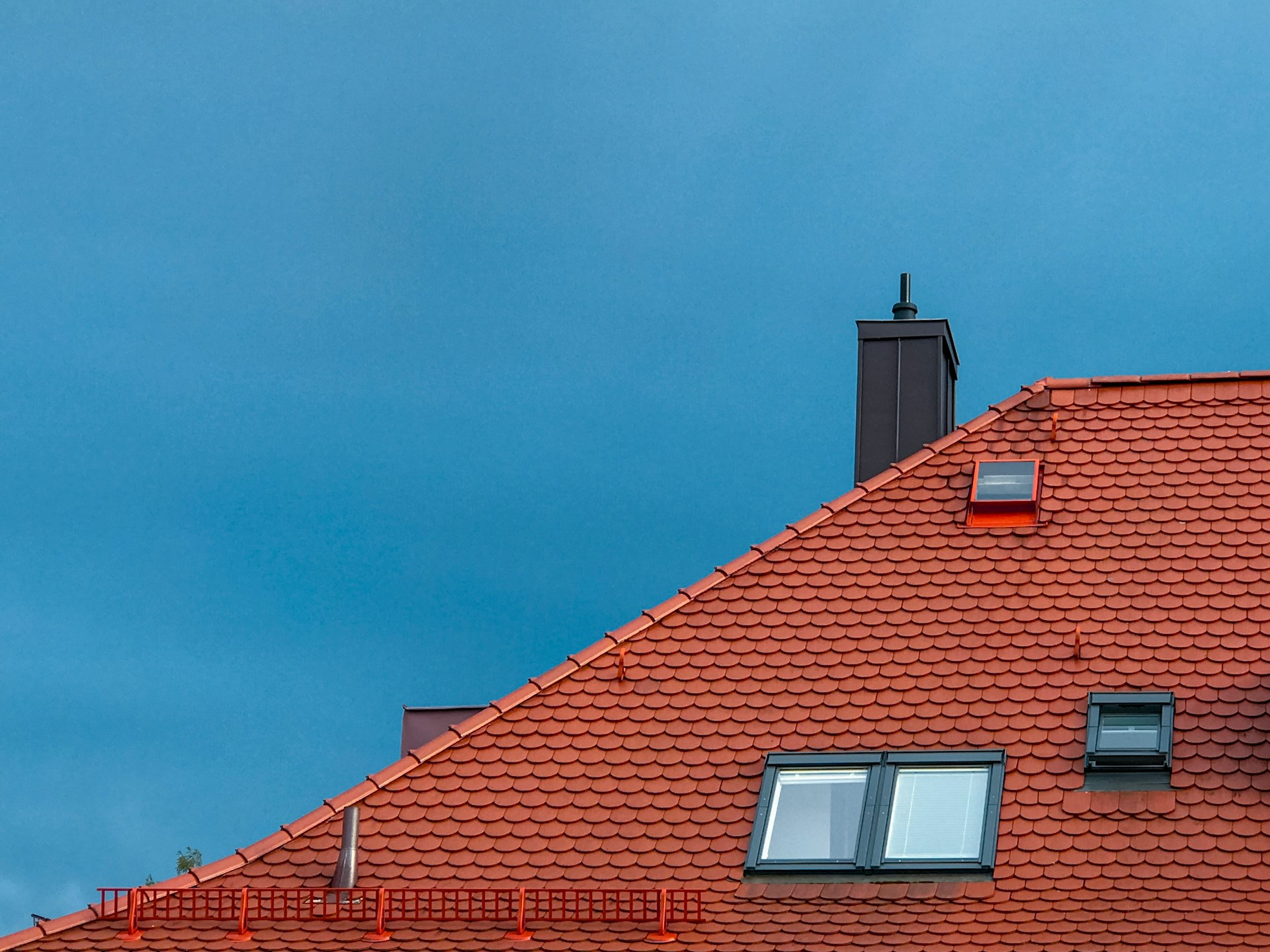 red brick roof top. Image by Unsplash