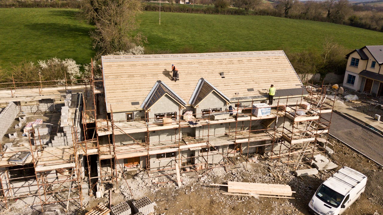 Arial phot of a house construction. Image by Pexels