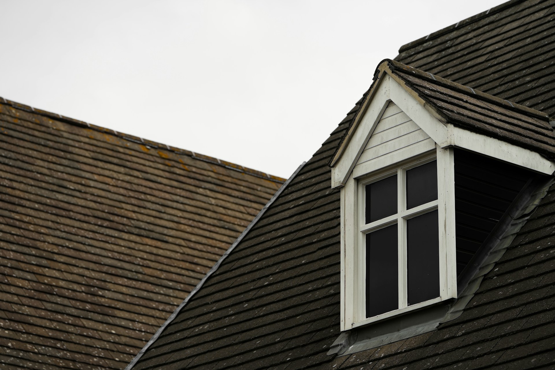 Wooden house with a window. Image by Unsplash