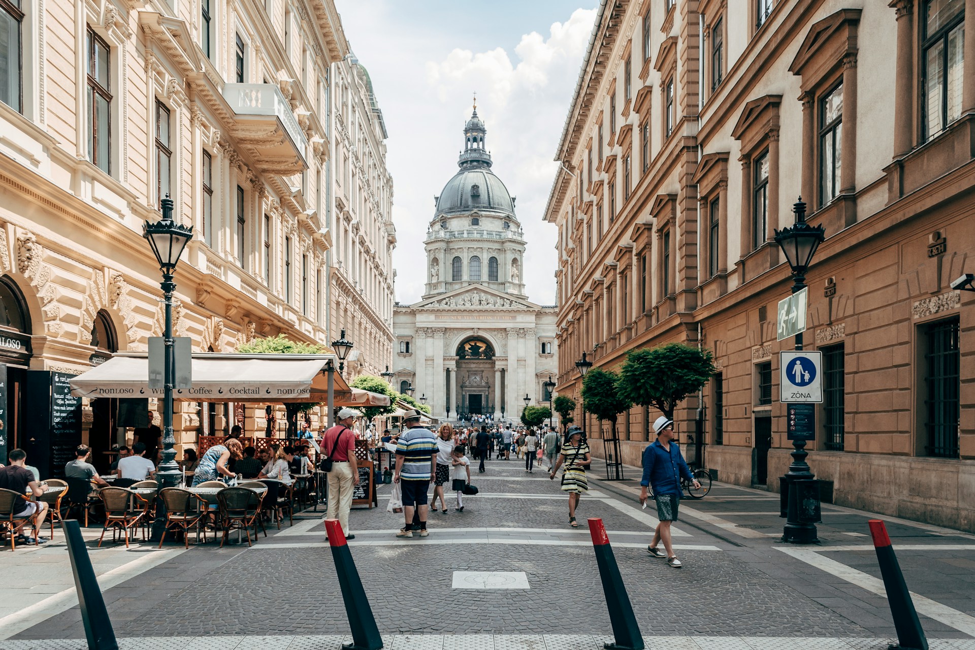 People walking down a street in Budapest Hungary. Image by Unsplash