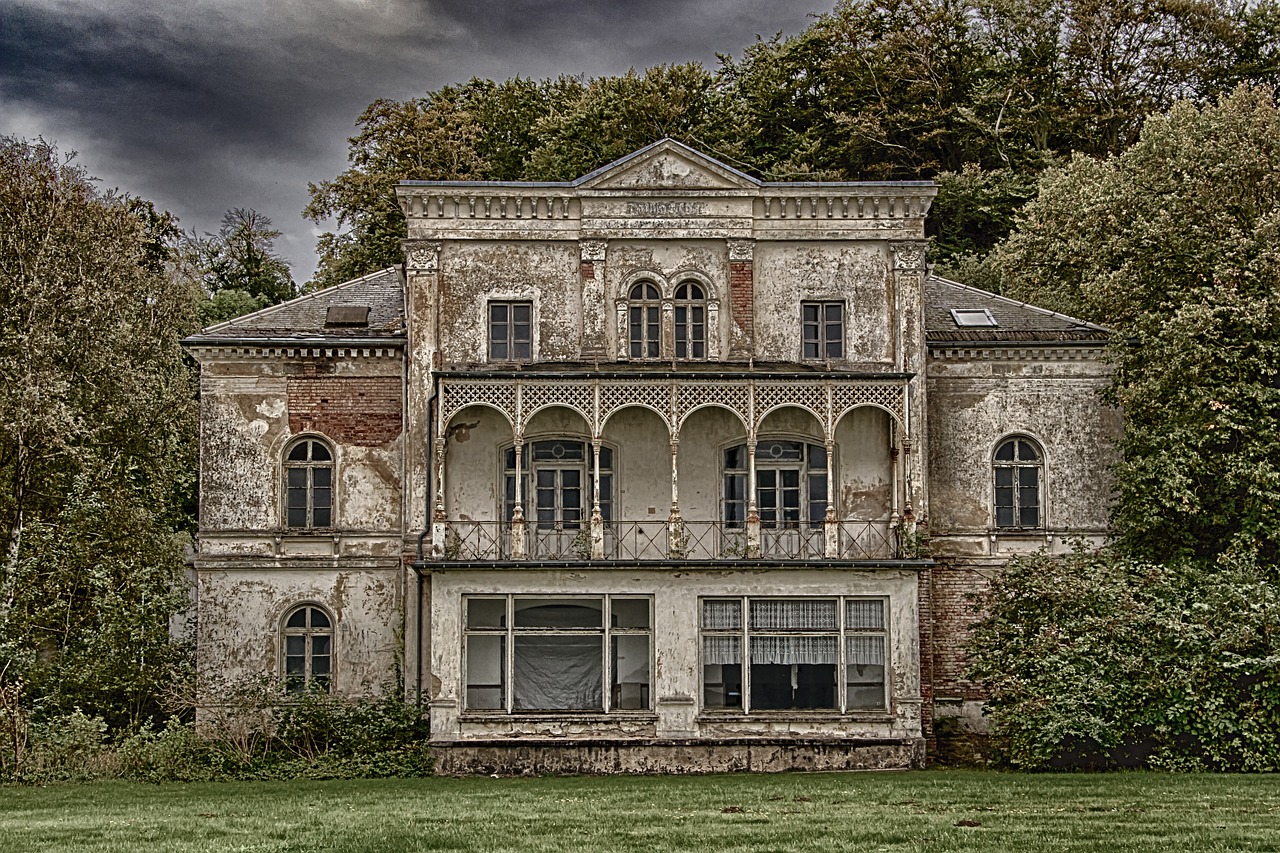 Brick house in poor condition. Dark grey sky.