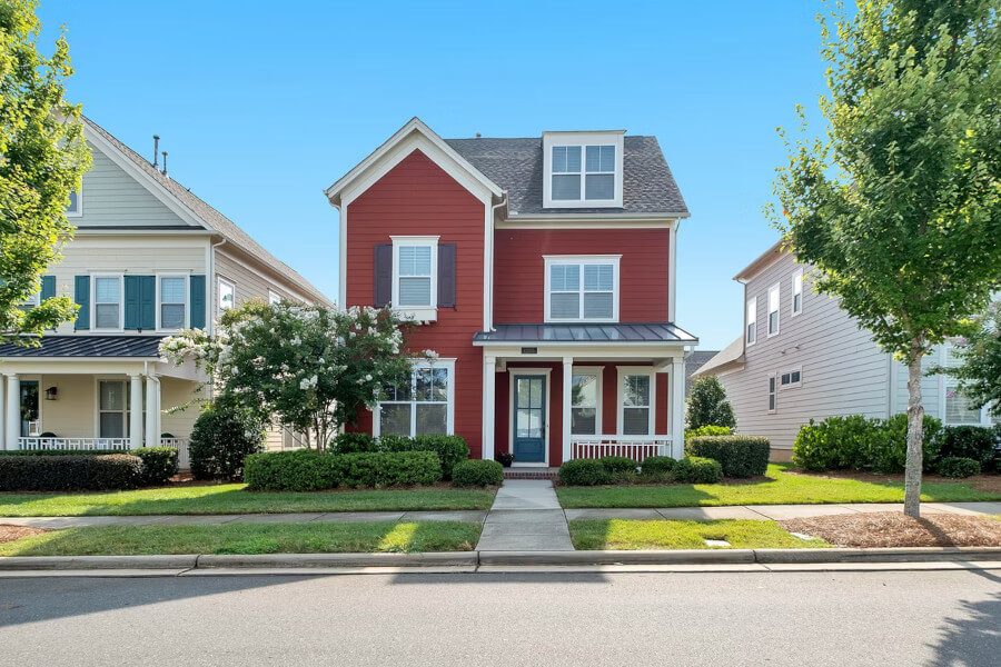 Red house, small white porch