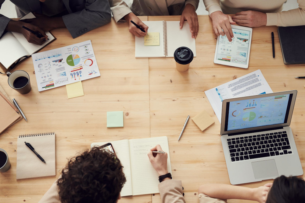 people around a desk