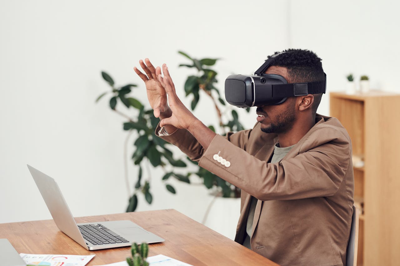person using VR headset, by Unsplash