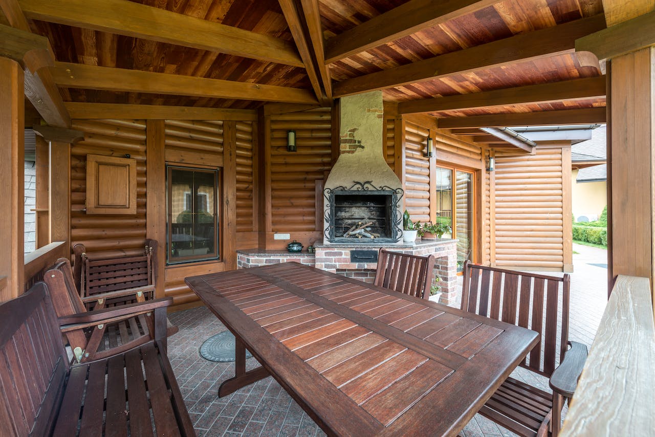 Patio, outdoor fireplace. Image by Pexels