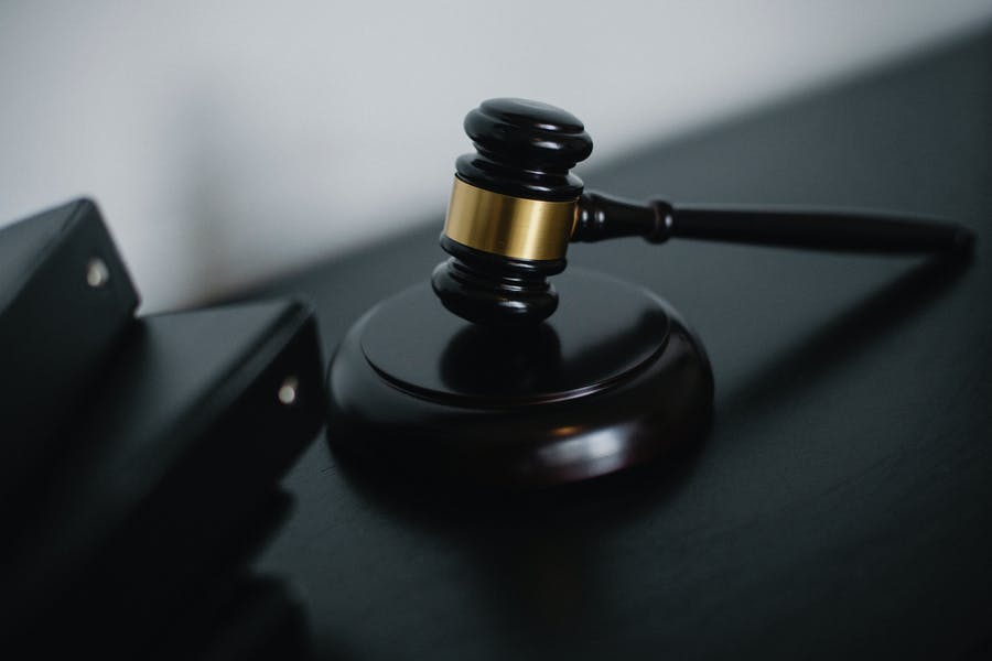 Black wooden gavel. Image by Pexels