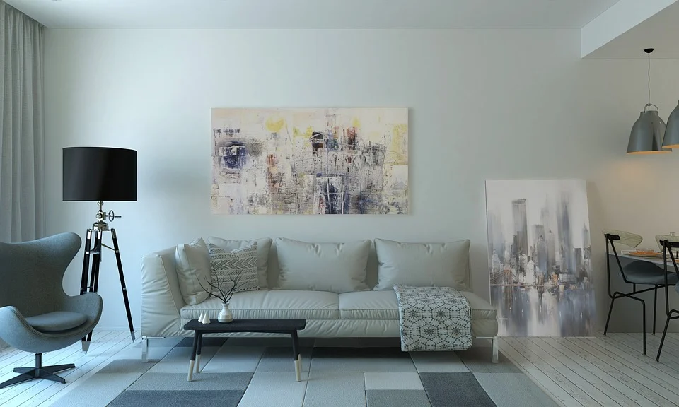 livingroom, art on wall and flor, modern light and chair, sofa
