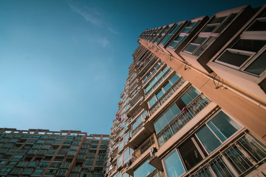 high rise apartment buildings, blue sky