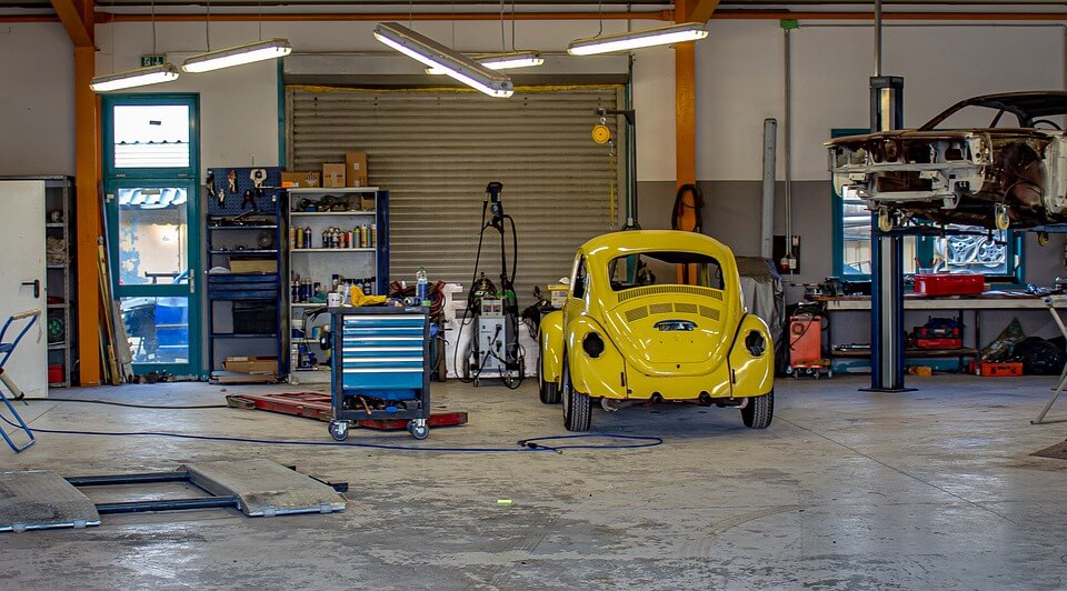 VW beetle pared in a garage