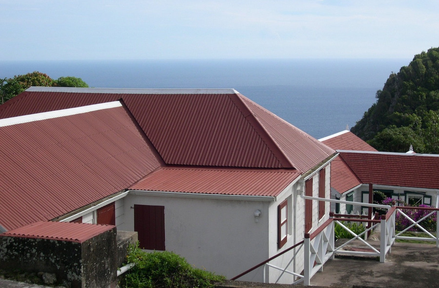 white house with red roof