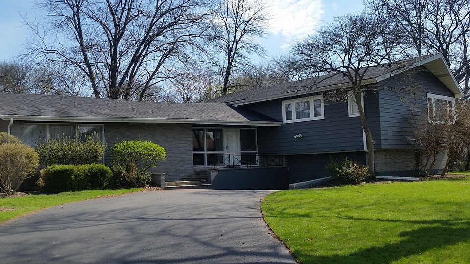 House with green front yard.